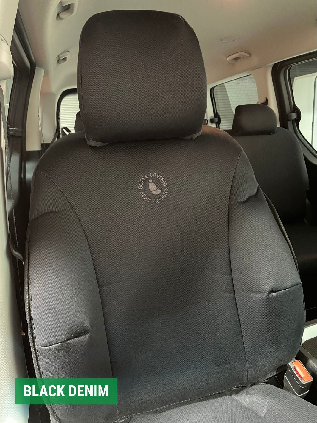 close up of hyundai staria driver seat cover in black denim