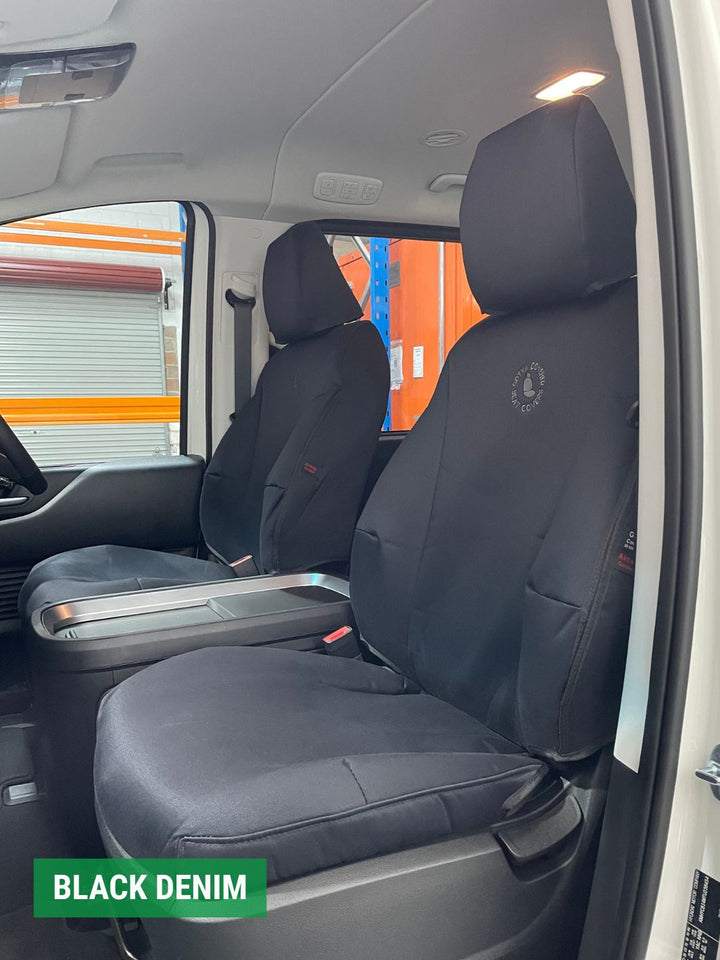 Black denim car seat covers inside staria vehicle with visible branding.