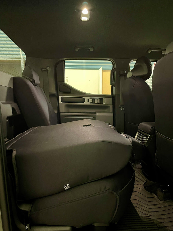 kia tasman rear 60/40 split seat folded down.