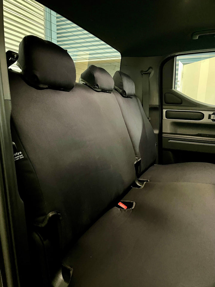 close up showing rear seat covers fitted to kia tasman.